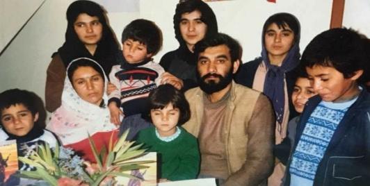 Gholam Muhammad Sabori (seated right), with his spouse (seated left), children, a sister and a niece. The picture was taken (circa 1991) after a RAWA school function in Quetta.