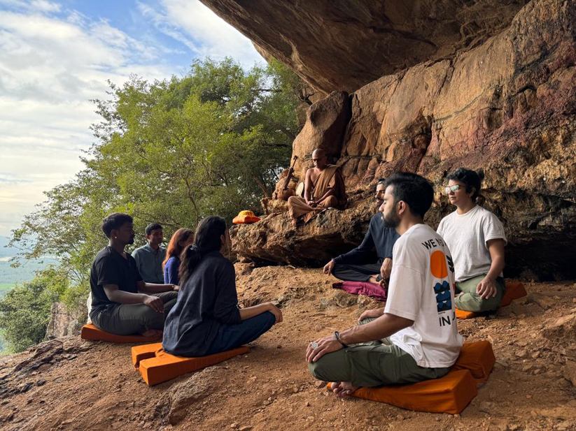 Meditation session in the mountains after a hike. Photo via Dimantha Thenuwara