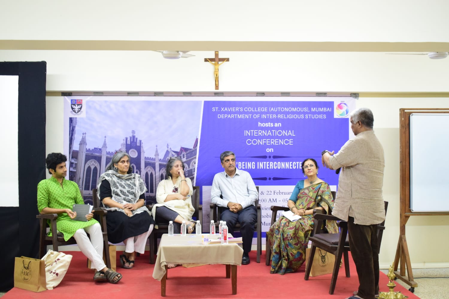 (Being Interconnected): Rector of St.Xavier’s College in Mumbai, Fr. Keith Dsouza, welcomes speakers during a session at the ‘Being Interconnected’ Conference. Photo courtesy: Dr. Radha Kumar 