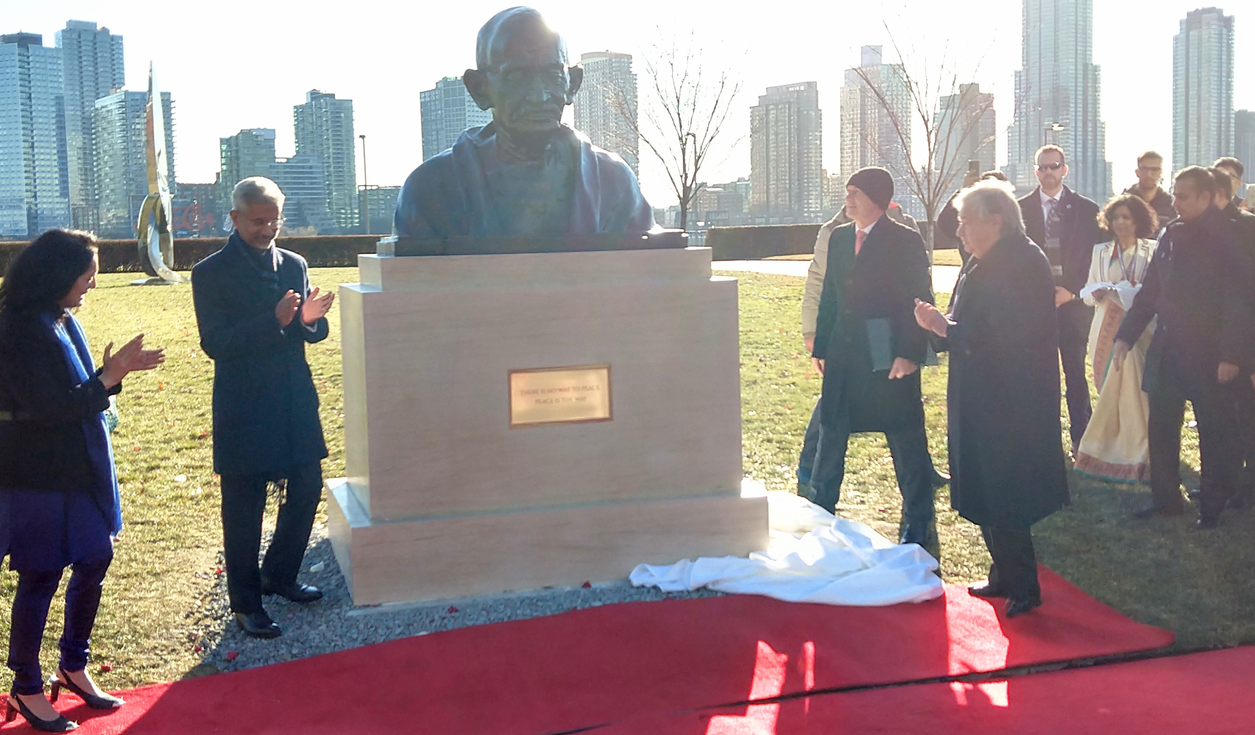 Statue of Mahatma Gandhi was unveiled at the United Nations on New York on Wednesday, December 14, 2022. Flanking the sculpture are India's External Affairs Minister S. Jaishankar and Secretary-General Antonio Guterres (right). (Photo: Arul Louis)