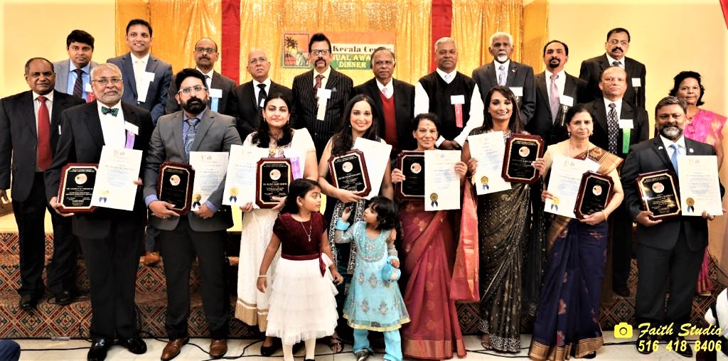 Kerala Center officials and Consul Vijayakrishnan with awardees. Front row, from l. to r.: Dr. George Abraham, Dr. Sabu Varghese, Dr. Blessy Joseph, Dr. Devi Nampiaparampil, Dancer and Teacher Chandrika Kurup, Nandini Nair Esq., Mary Philip and Mayor Robin Elackatt. Back row, from l. to r.: Dr. Thomas Abraham, Dr. Madhu Bhaskaran, Jimmy John, Alex Esthappan, G. Mathai, Consul A.K. Vijayakrishnan, John Paul, James Thottam, Raju Thomas, Abraham Thomas and P.T. Paulose.