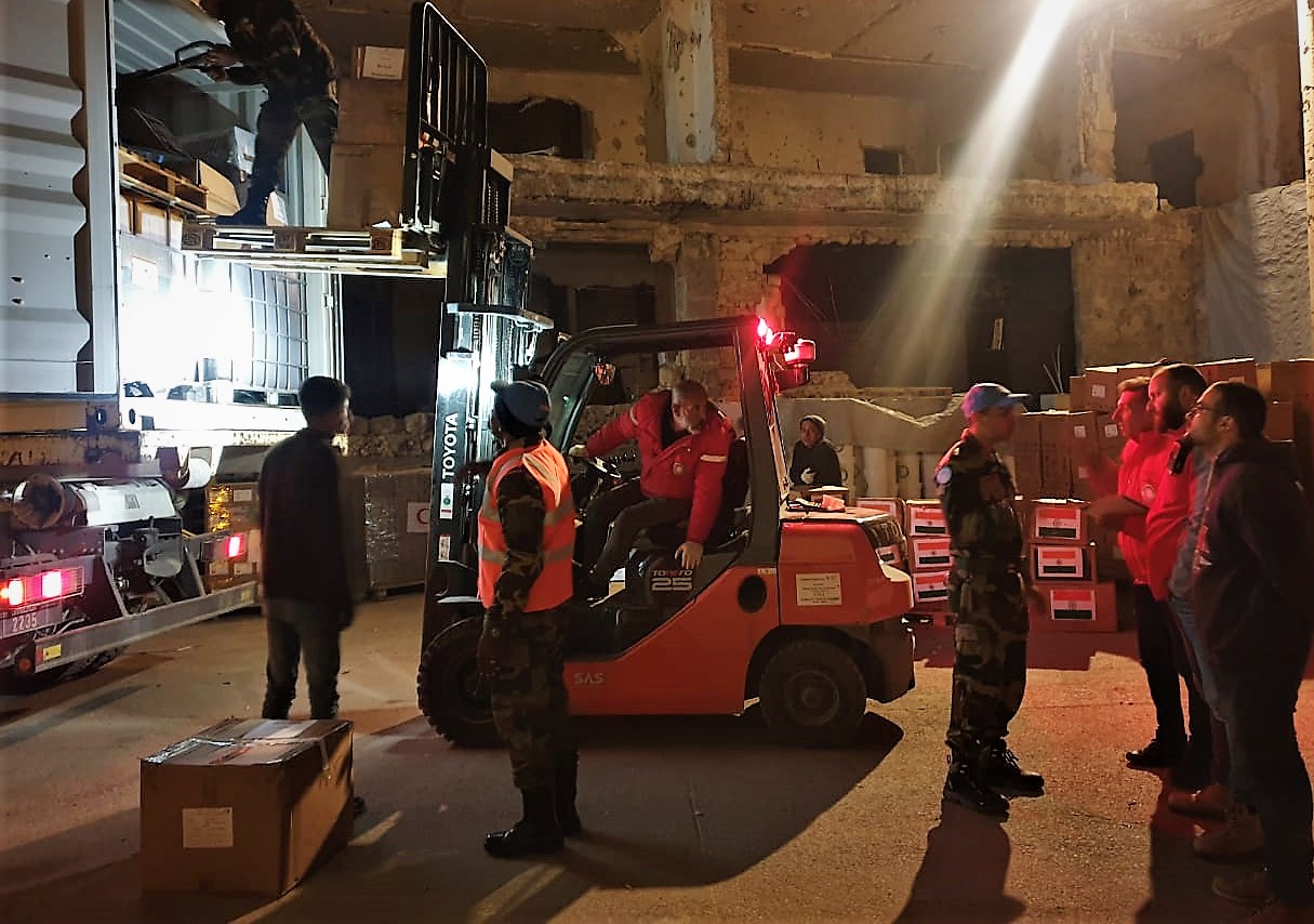 Relief supplies sent from India to help Syrians devastated by the earthquake are loaded on trucks on Tuesday, February 14, 2023, at Camp Fauoar of the UN peacekeeping operations in Syria. They were taken by Indian peacekeepers to Aleppo. (Photo: Courtesty UNDOF)
