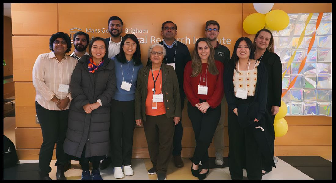 Prof. Hasan with the next generation: Students and colleagues gathered at Mass General Brigham to celebrate her 80th.