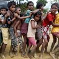 Rohingya refugee children queue for aid in Cox''s Bazar, Bangladesh