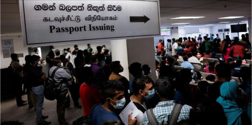 People wait to collect their passports at the Immigration and Emigration Department in Sri Lanka (Photo: Twitter)