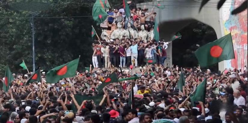 Bangladeshi citizens protest government in July 2024. Screenshot from ABC News Australia report.