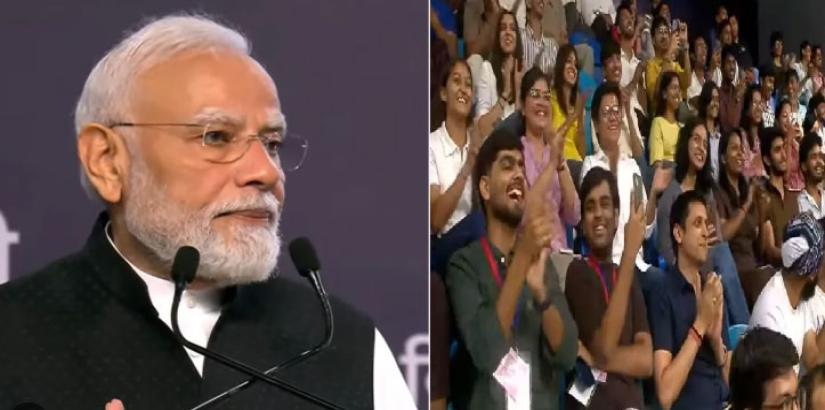 Modi gesticulating while speaking at Shri Ram College of Commerce