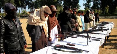 Taliban fighters attend a surrender ceremony in Jalalabad city, capital of Nangarhar province, Afghanistan, Feb. 8, 2020. (Photo by Saifurahman Safi/Xinhua)