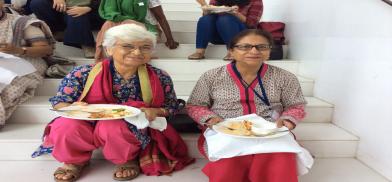 Breaking bread with South Asian feminists - India's Kamla Bhasin and late Pakistani human rights lawyer Asma Jahangir at IAWRT biennial in New Delhi. (Pic by Nupur Basu)