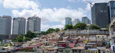 Slums with skyscrapers in the distance