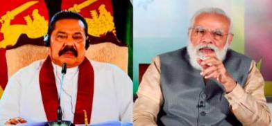 Sri Lankan Prime Minister Mahinda Rajapaksa and Indian Prime Minister Narendra Modi