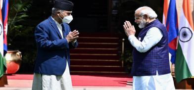 (Right) Indian Prime Minister Narendra Modi and (Left) Nepali Prime Minister Sher Bahadur Deuba