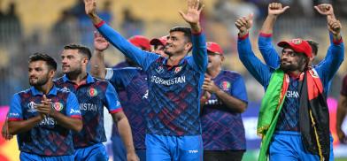 Afghanistan's players acknowledge the crowd after winning their match against Pakistan during the ICC Men's Cricket World Cup in Chennai, India, on October 23, 2023