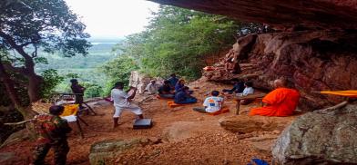 Meditation session in the mountain after a hike. Photo via Dimantha Thenuwara