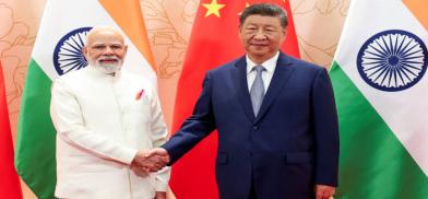 Xi and Modi handshake at Tianjin Xi and Modi handshake at Tianjin