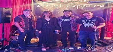 Members of the band Ghost Peppers (L-R) Amrita Ghosh (vocals), Kevin Meehan (multi-instrumentalist), Eddy Jo Martinez (lead guitar), and James Campbell (drums/percussion) Photo: Arjun G. Shee