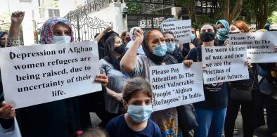 Afghan refugees protesting outside UNHCR office in New Delhi