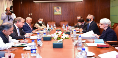 Foreign Minister Shah Mahmood Qureshi (C-L) and US Deputy Secretary of State Wendy Sherman (C-R) meet at the Foreign Office on Friday (Photo courtesy: DAWN)