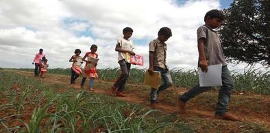 Village children going to school (Photo: Youtube)