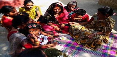 Shital pati mats being used for sitting in Bangladesh