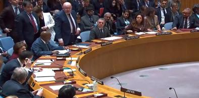 Russia’s Permanent Representative Vassily Nebenzia gestures to United Nations Secretary-General Antonio Guterres to rise up for a moment of silence he had requested at the Security Council on Friday, February 24, 2023, for all victims of conflicts in Ukraine. (Photo Source: UN)