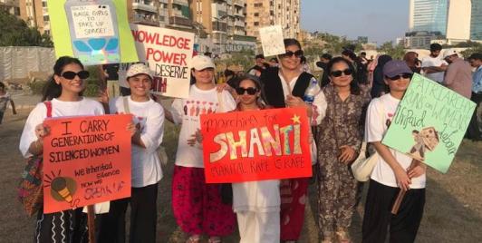 Women holding placards against patriarchy, marital rape, and the burden of intergenerational silence. Aurat March Karachi, 10 May 2026. Photo by Abdullah Zahid/ Sapan News.