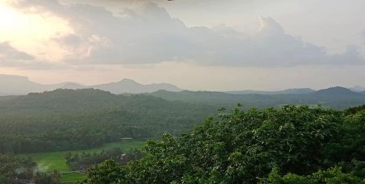 Sunset from a mountaintop in Sri Lanka. Photo by SinhaRaja Tammita-Delgoda.