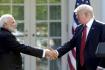 President Donald Trump and Prime Minister Narendra Modi shake hands